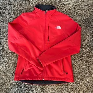 Women’s North Face soft shell jacket. Radiant red w/black accents,women’s large